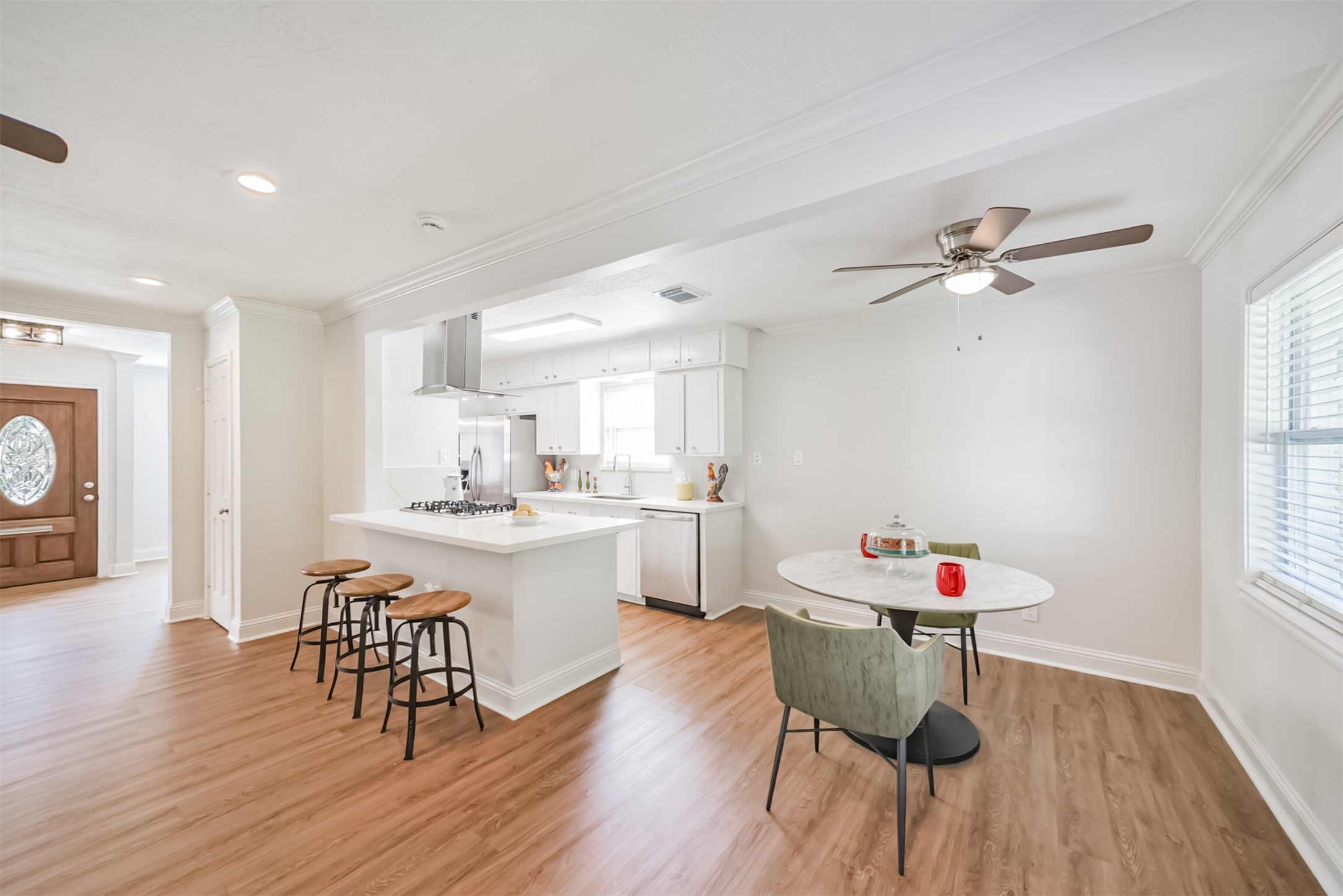 3319 Springrock Lane Houston, TX 77080 - Photo 14 of 41 a view of a dining room with furniture and wooden floor