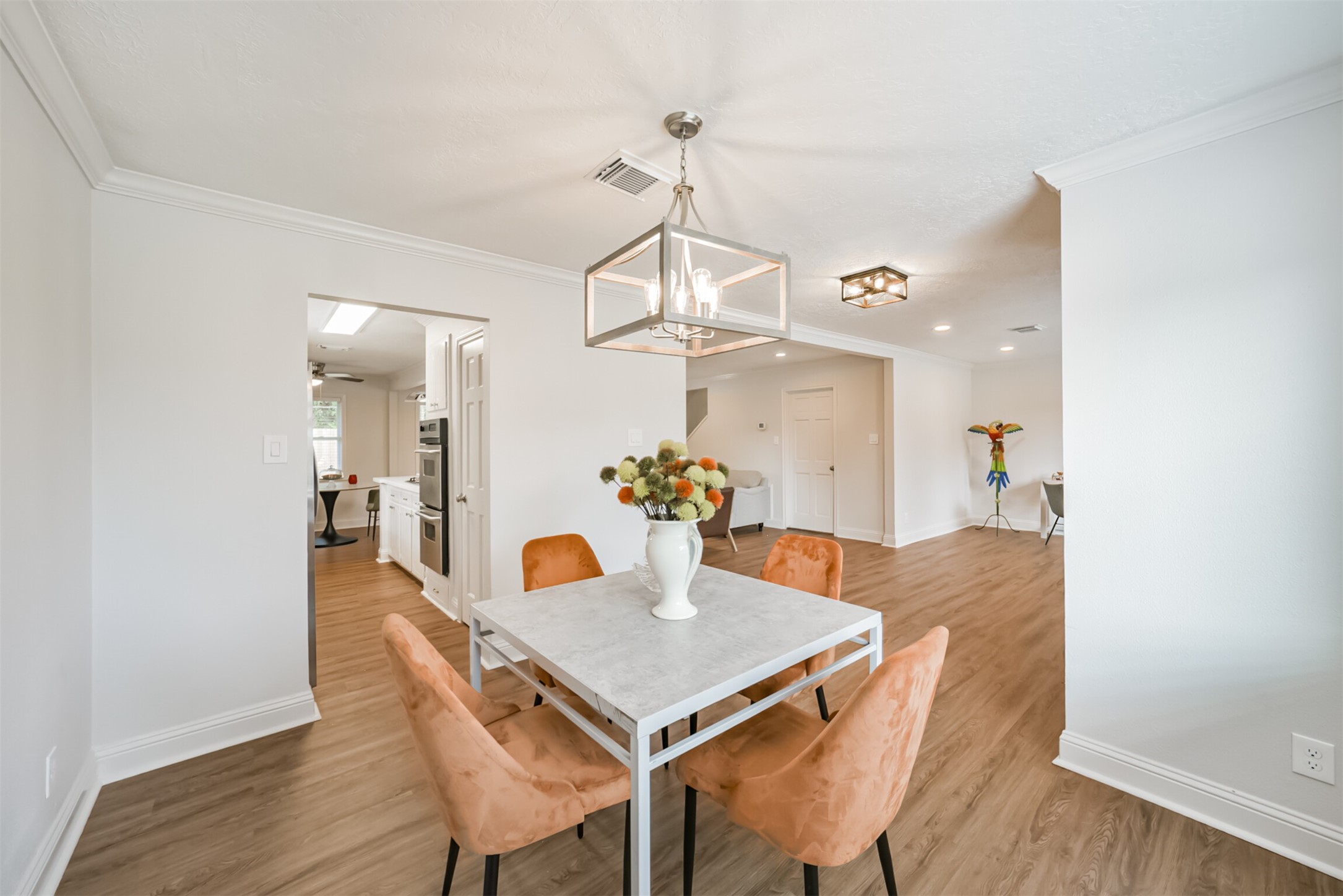 3319 Springrock Lane Houston, TX 77080 - Photo 17 of 41 a view of a dining room with a table and chairs