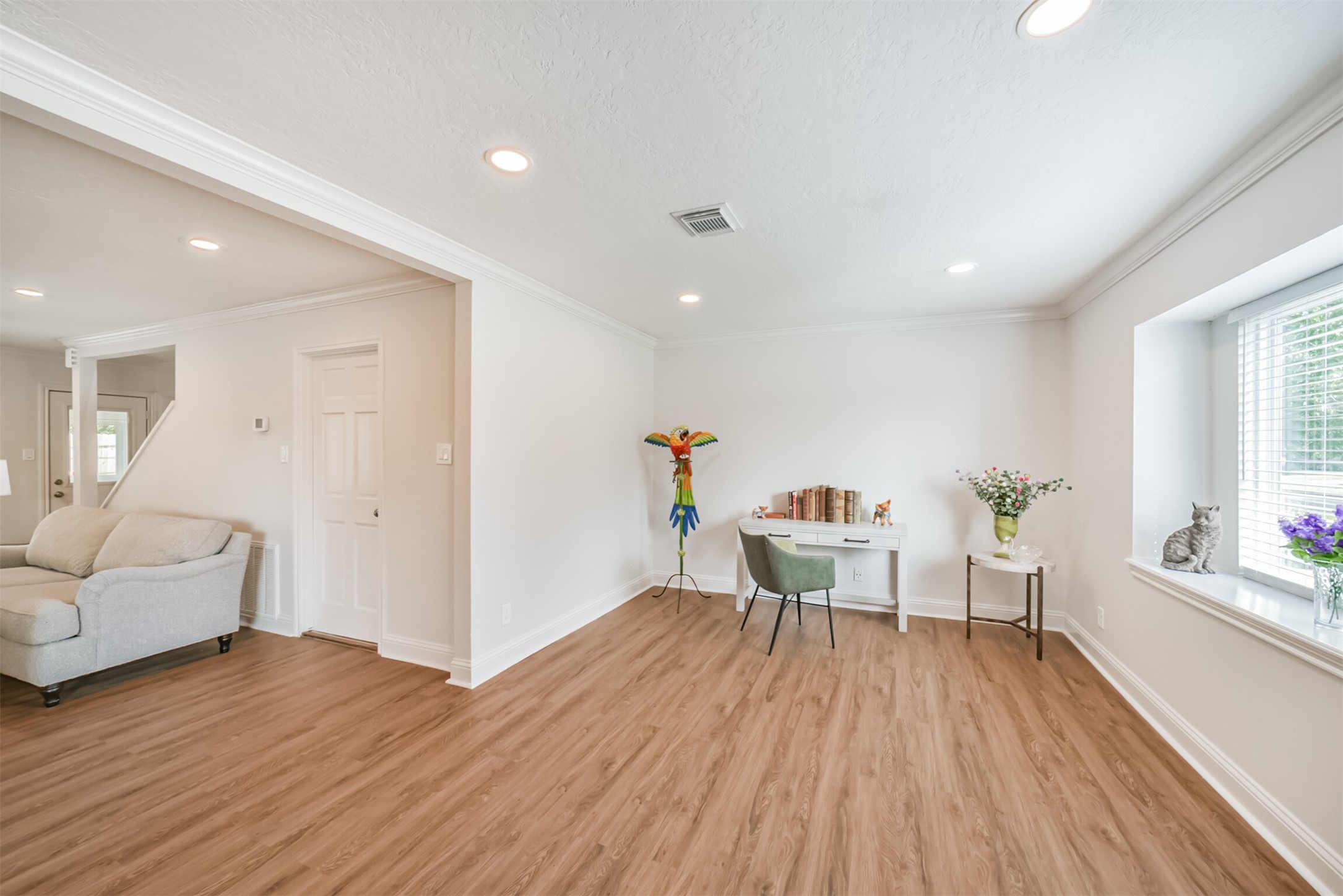 3319 Springrock Lane Houston, TX 77080 - Photo 18 of 41 a living room with furniture and a wooden floor