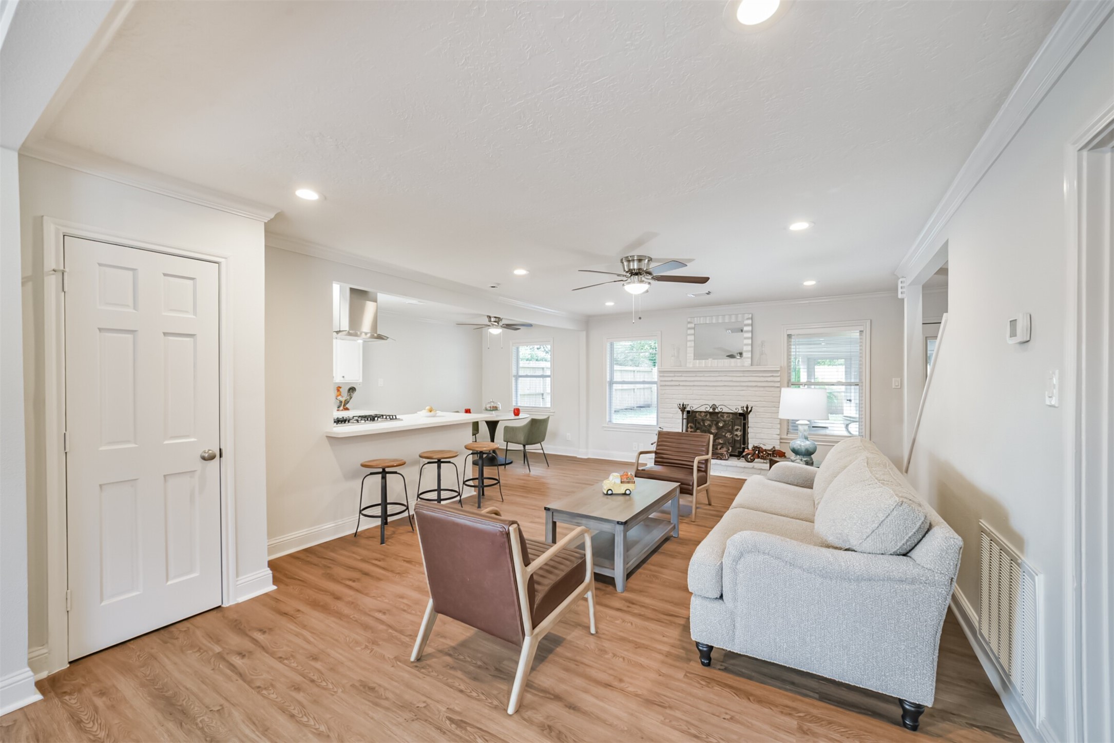 3319 Springrock Lane Houston, TX 77080 - Photo 3 of 41 a living room with furniture and wooden floor