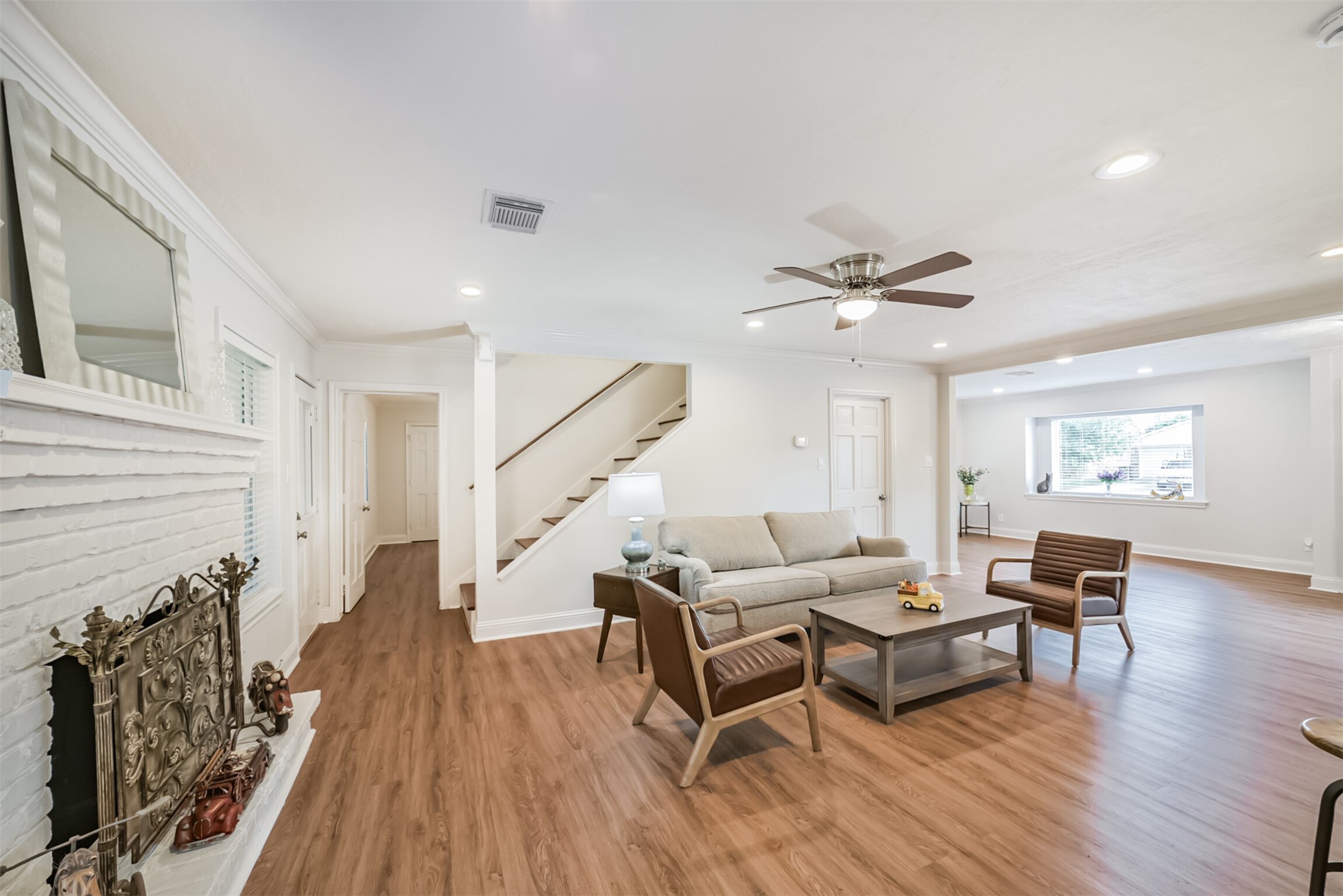 3319 Springrock Lane Houston, TX 77080 - Photo 4 of 41 a living room with furniture and wooden floor