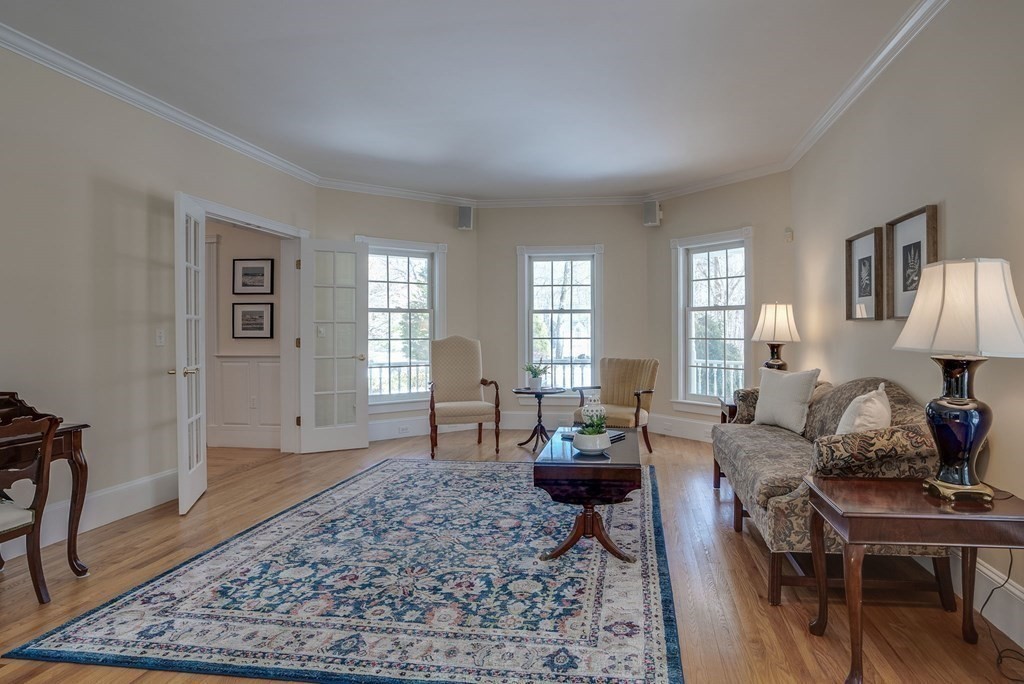 26 Coventry Road Atkinson, NH 03811 - Photo 12 of 42 a living room with furniture rug and window