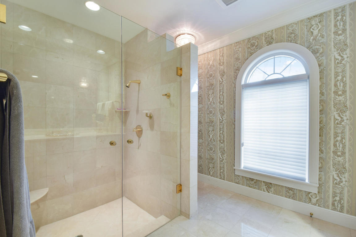 6318 Woodbury Road Boca Raton, FL 33433 - Photo 25 of 52 a view of a bathroom with a shower