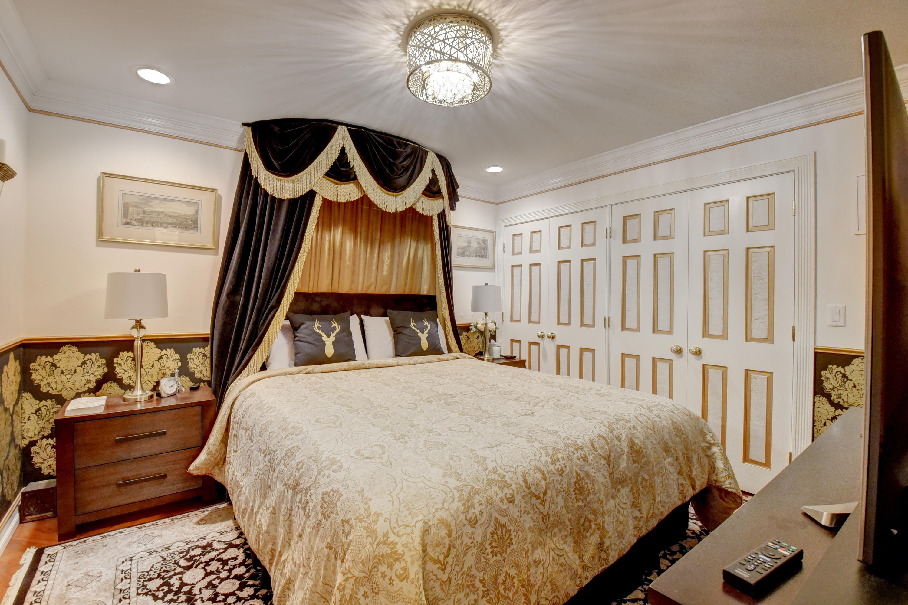 6318 Woodbury Road Boca Raton, FL 33433 - Photo 26 of 52 a bedroom with a bed next to a window with outer view