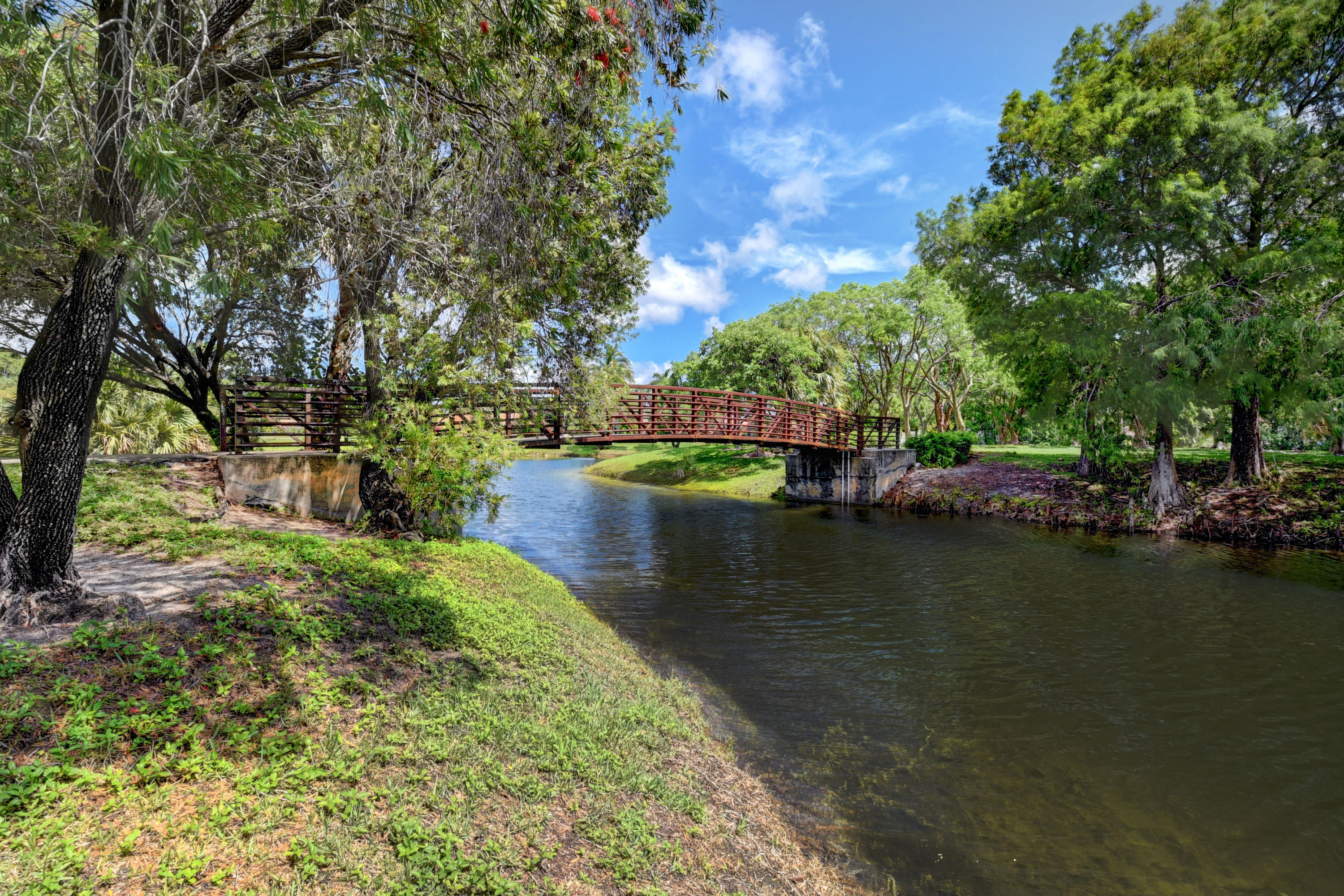 6318 Woodbury Road Boca Raton, FL 33433 - Photo 39 of 52 a view of a lake with houses