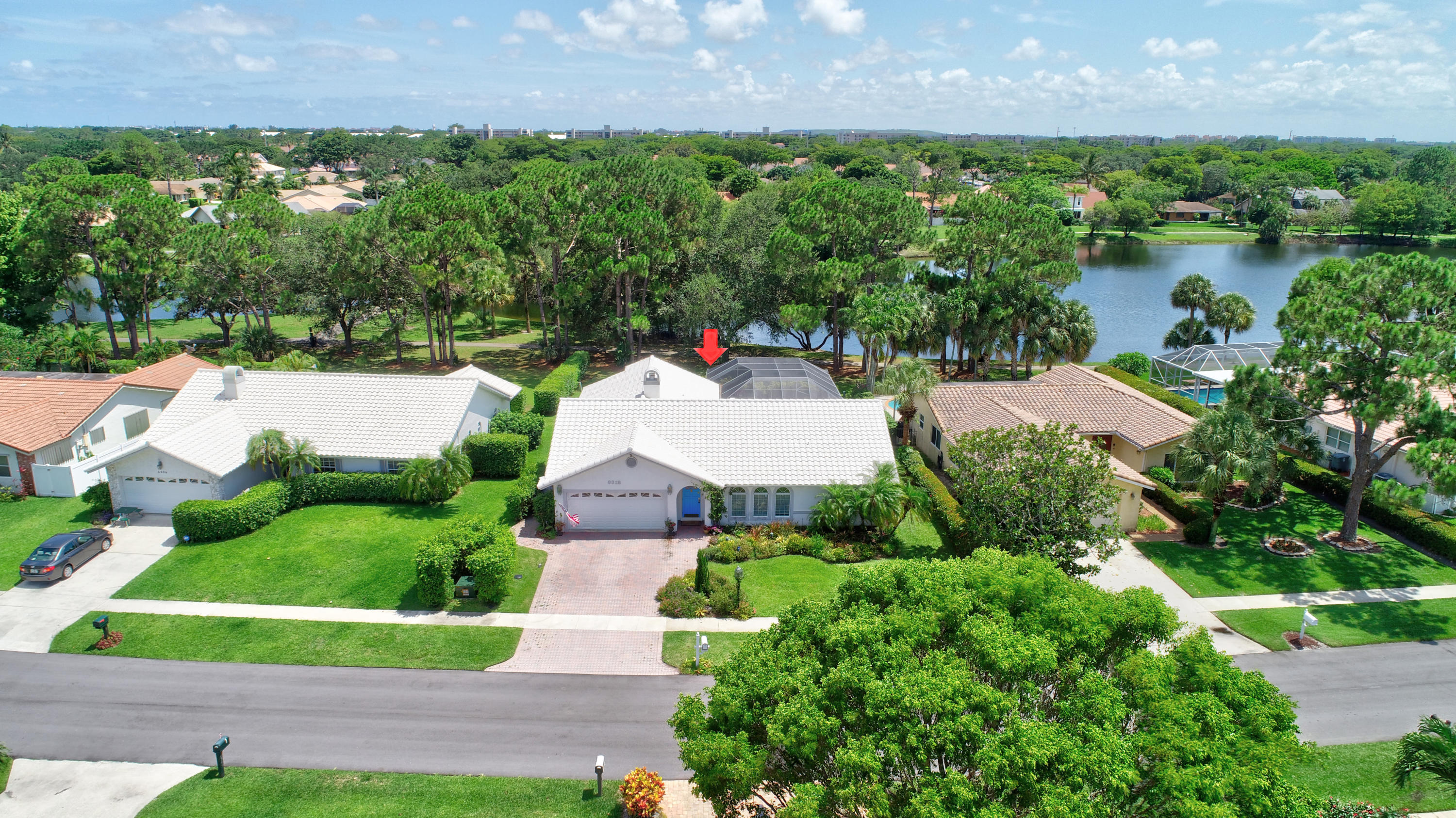 6318 Woodbury Road Boca Raton, FL 33433 - Photo 42 of 52 an aerial view of a house with garden space and street view
