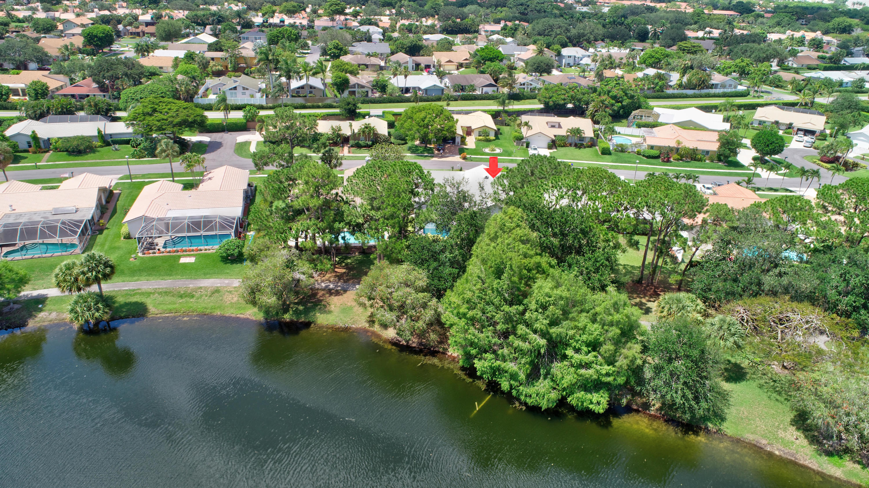 6318 Woodbury Road Boca Raton, FL 33433 - Photo 44 of 52 a view of a lake with a city