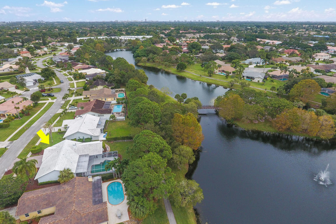 6318 Woodbury Road Boca Raton, FL 33433 - Photo 51 of 52 an aerial view of lake and residential houses with outdoor space