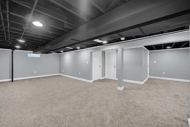 a bathroom with a toilet a sink and a bathtub