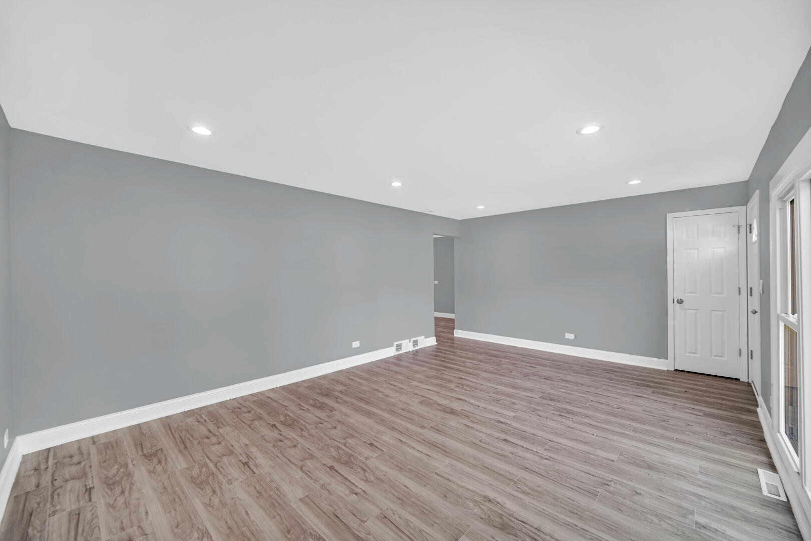 8013 Monaldi Drive Munster, IN 46321 - Photo 2 of 24 a view of an empty room with wooden floor