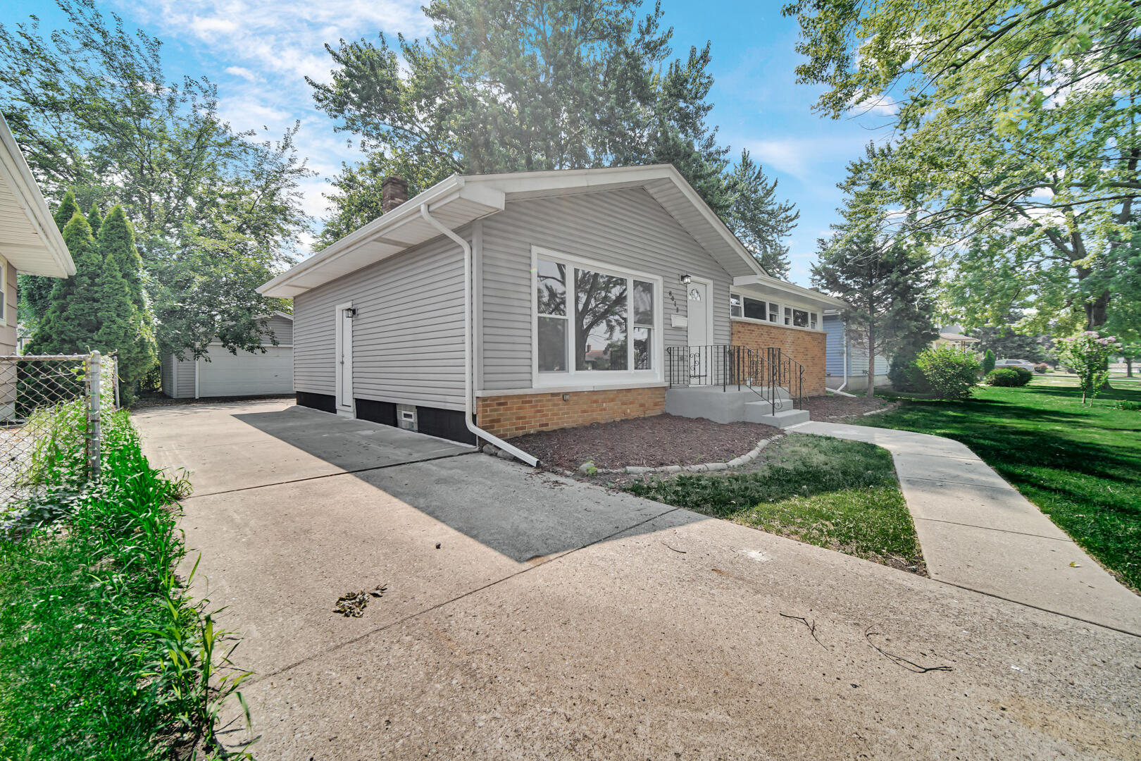 8013 Monaldi Drive Munster, IN 46321 - Photo 21 of 24 a view of a house with a yard