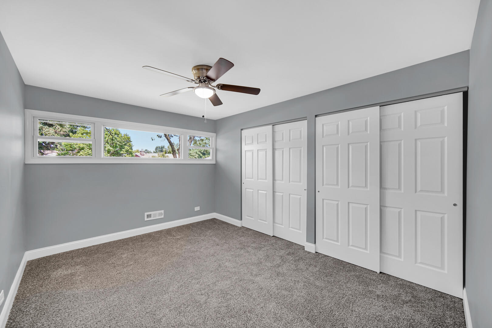 8013 Monaldi Drive Munster, IN 46321 - Photo 4 of 24 a view of an empty room with a window