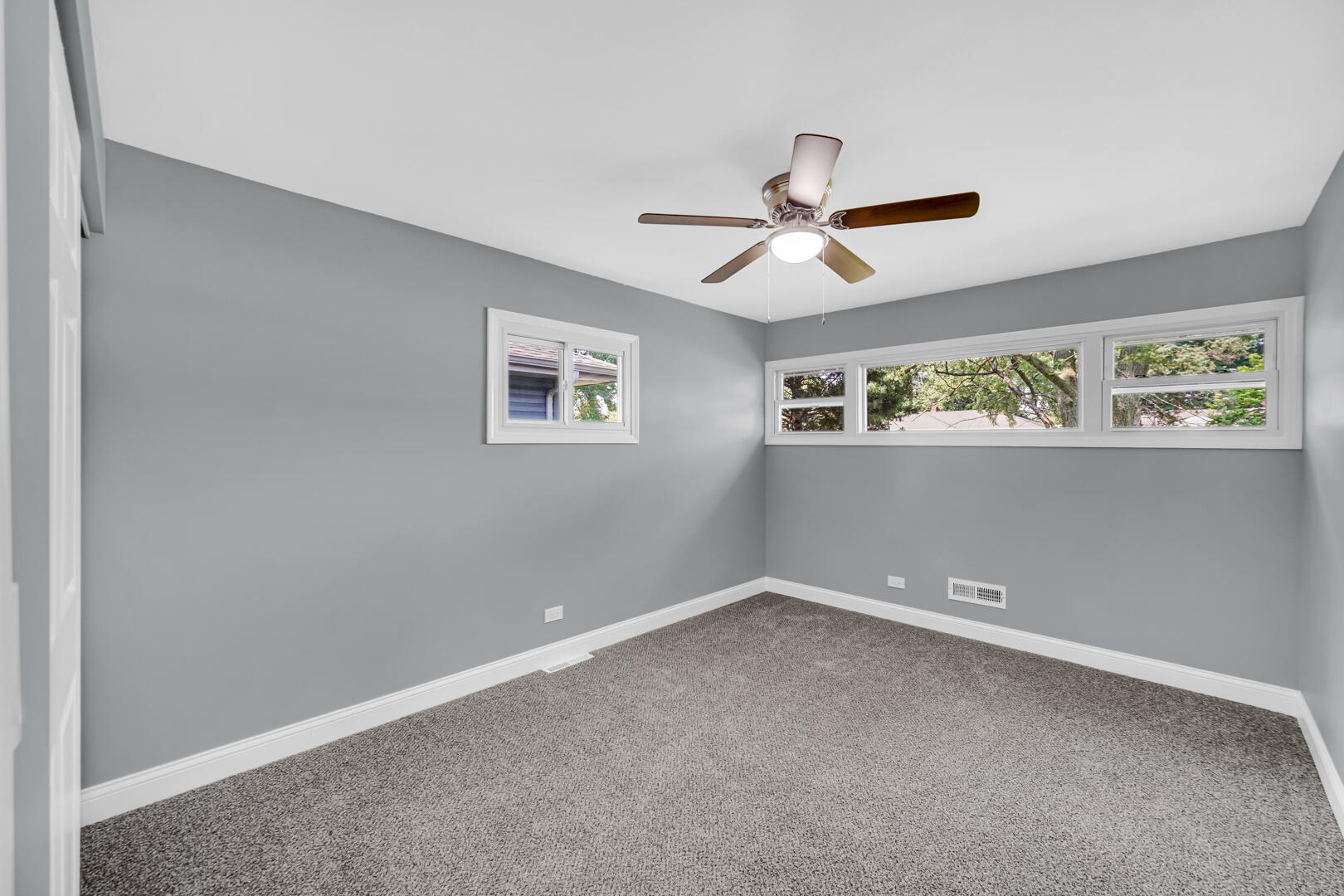 8013 Monaldi Drive Munster, IN 46321 - Photo 6 of 24 a view of room with ceiling fan