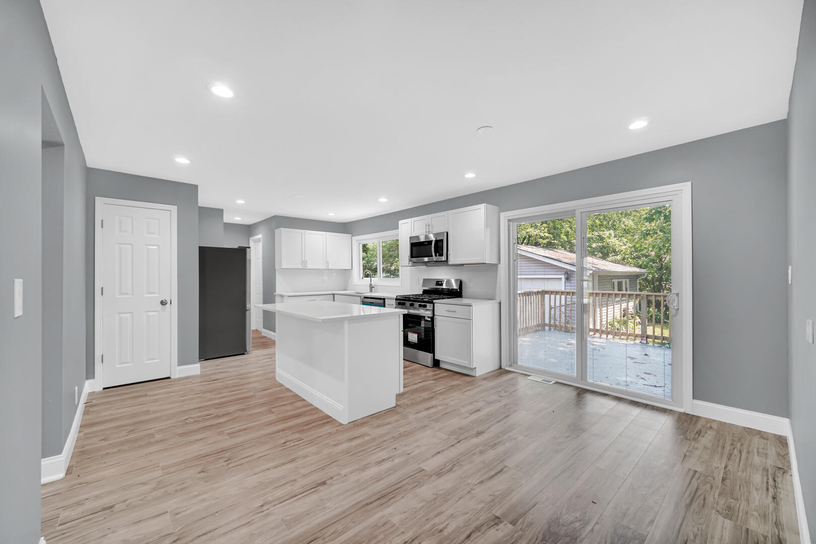 8013 Monaldi Drive Munster, IN 46321 - Photo 9 of 24 a view of a kitchen with wooden floor
