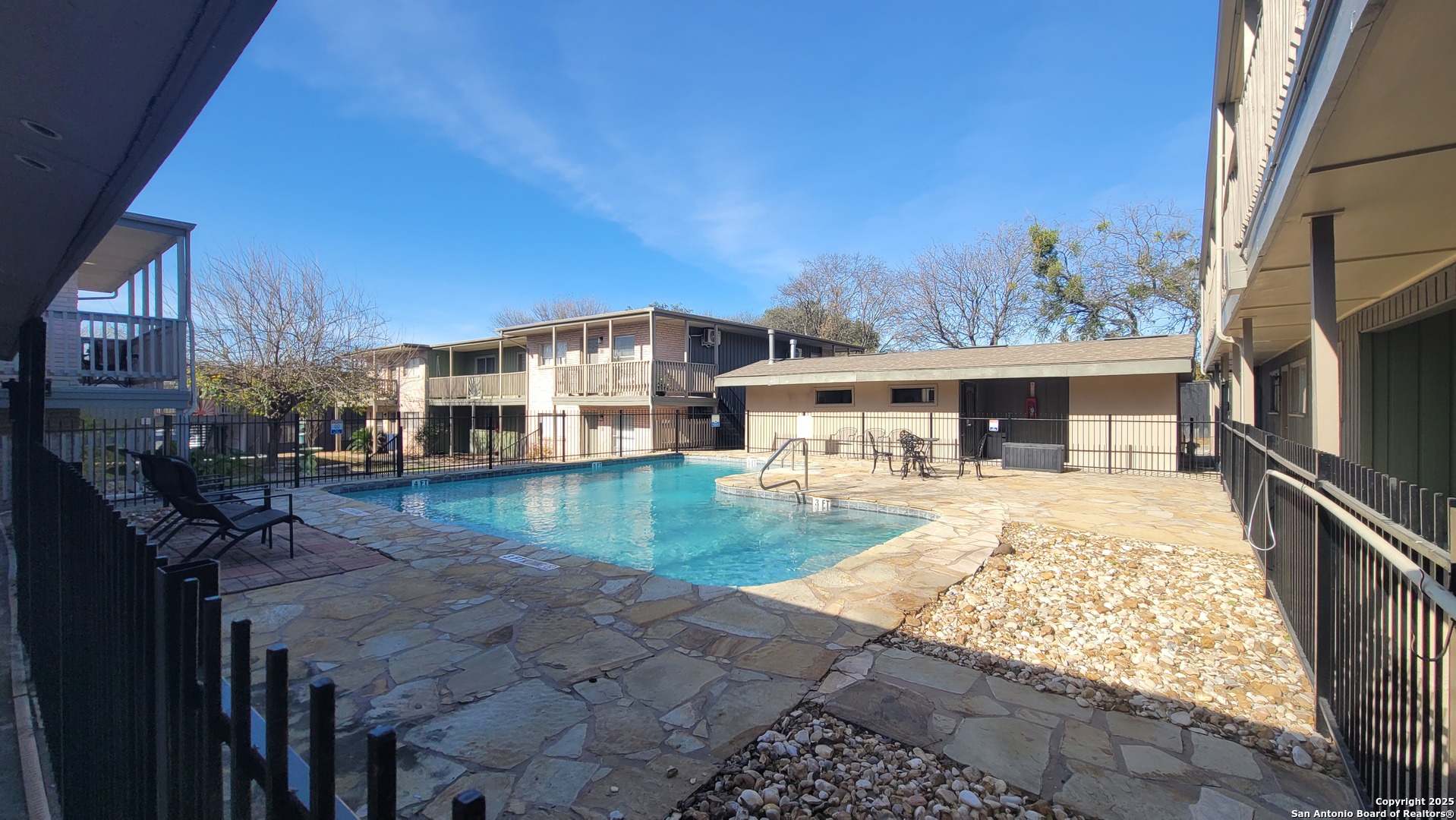 516 Gentleman Road, Unit 15 San Antonio, TX 78201 - Photo 2 of 12 a front view of a house with garden