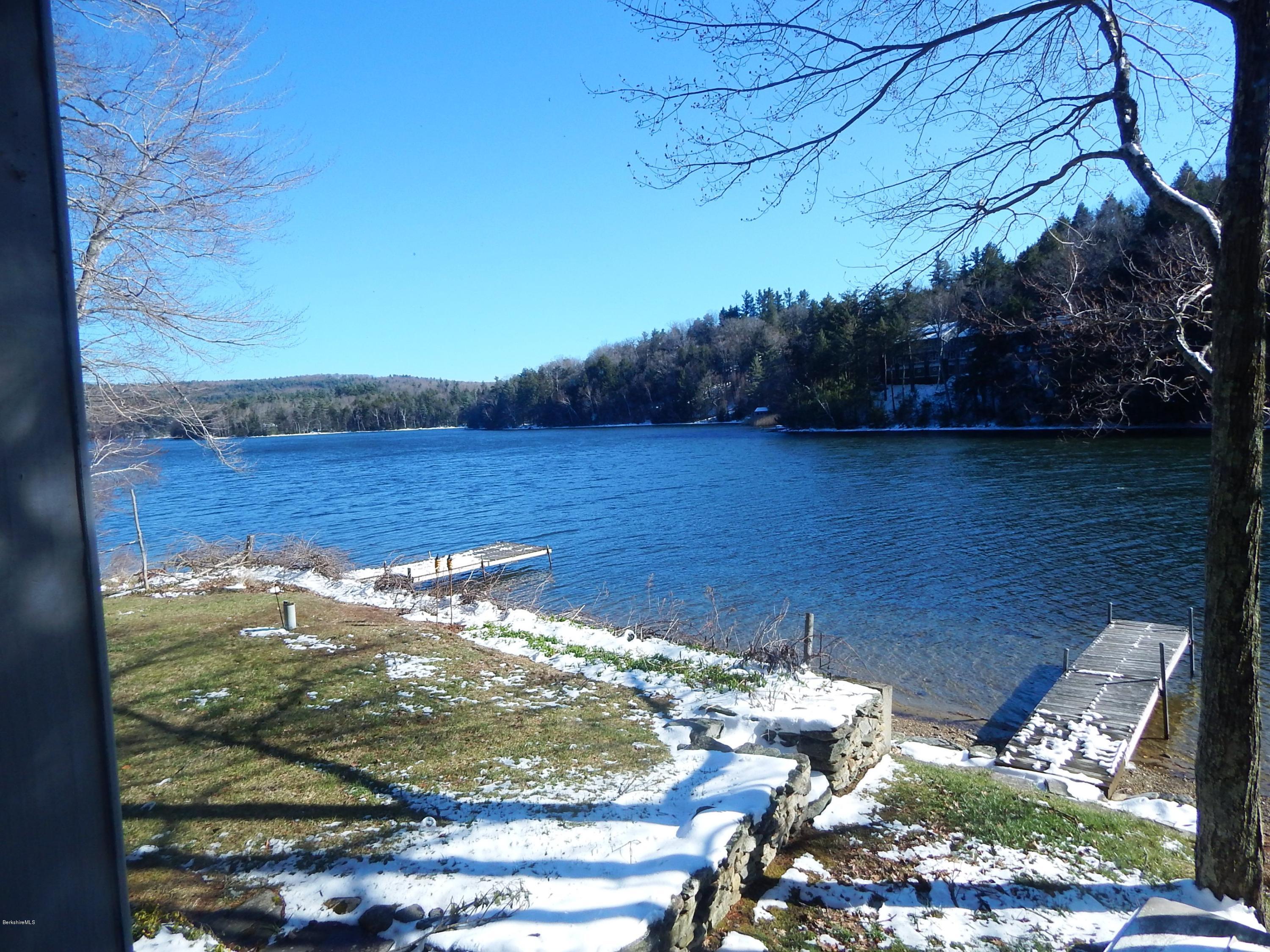 25 Point Road Monterey, MA 01245 - Photo 17 of 19 a view of a lake from a balcony