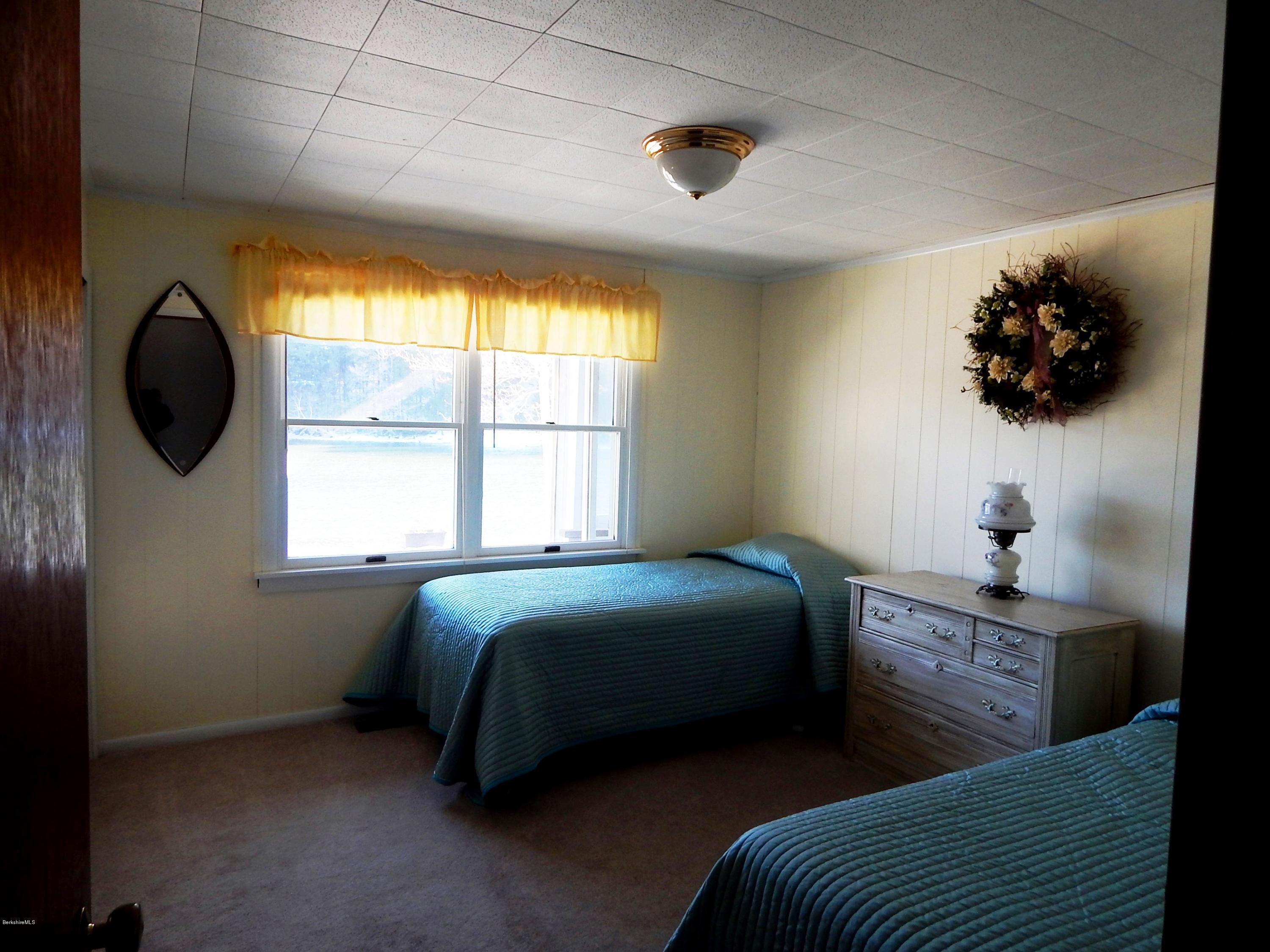 25 Point Road Monterey, MA 01245 - Photo 6 of 19 a bedroom with a bed and a window