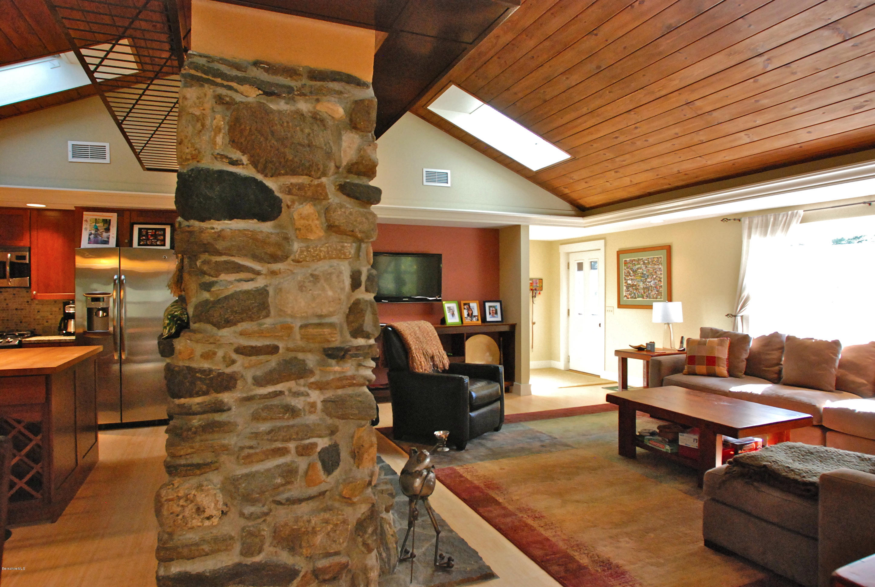 101 Tyringham Road Monterey, MA 01245 - Photo 3 of 36 a living room with patio furniture and a rug