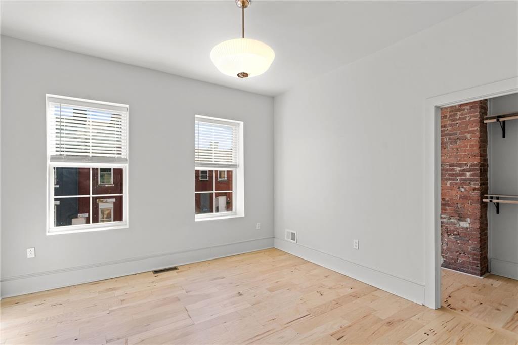 2011 Forbes Avenue Pittsburgh, PA 15219 - Photo 19 of 41 a view of an empty room with a window