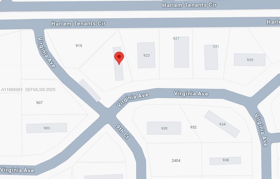 919 Virginia Avenue Clewiston, FL 33440 - Photo 10 of 11 a view of a hallway with mirror