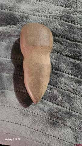 a view of a backyard of the house