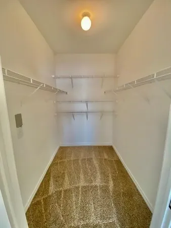 a view of a room with racks on the wall
