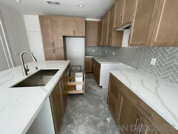 a view of living room with furniture and rug