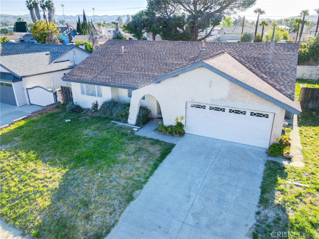 1108 Waltham Road Simi Valley, CA 93065 - Photo 20 of 25 a aerial view of a house next to a yard and potted plants
