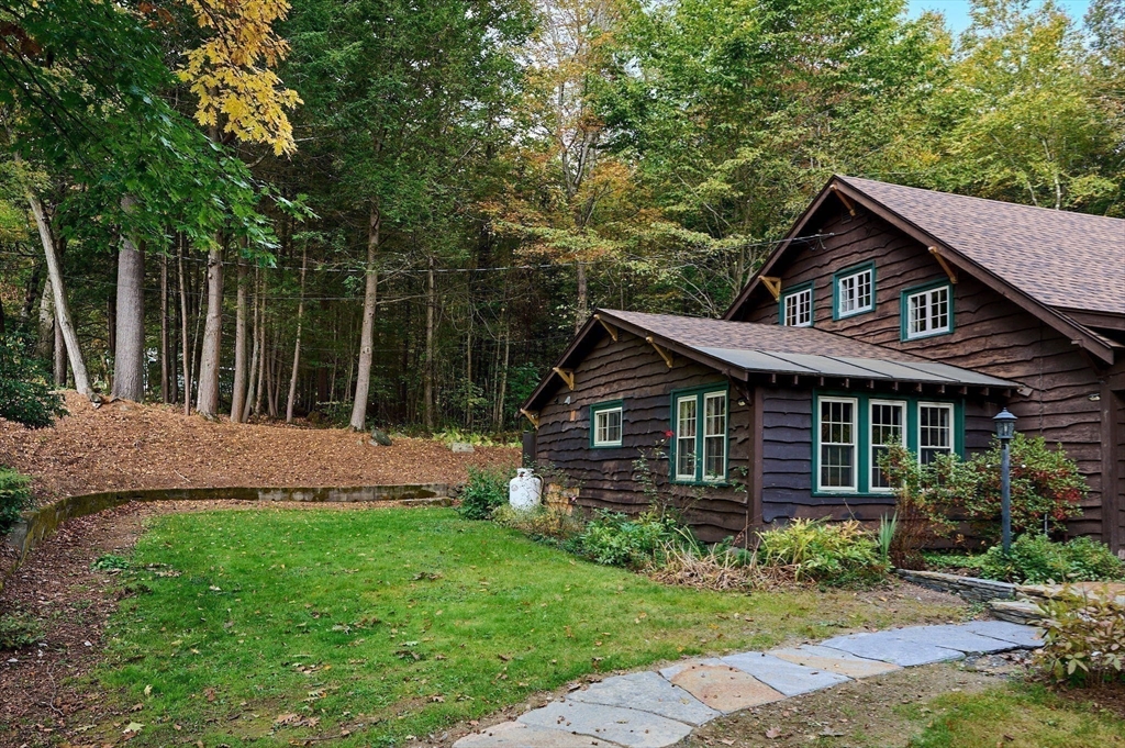 10 Walker Road Buckland, MA 01370 - Photo 28 of 41 a front view of a house with garden