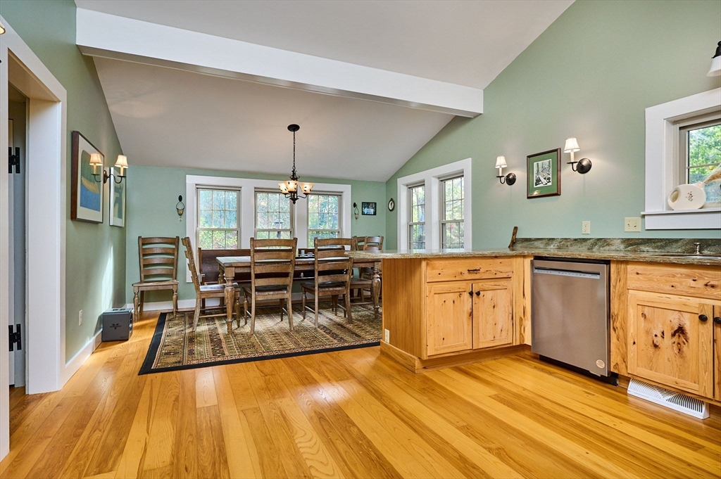 10 Walker Road Buckland, MA 01370 - Photo 9 of 41 a dining hall with stainless steel appliances granite countertop a stove and a wooden floors