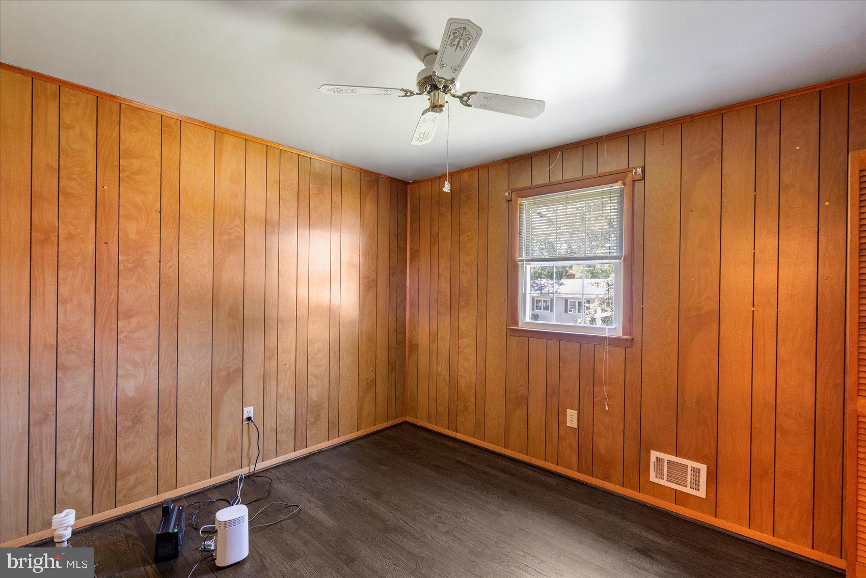 8261 Spring Knoll Drive Pasadena, MD 21122 - Photo 22 of 49 a view of an empty room with a window