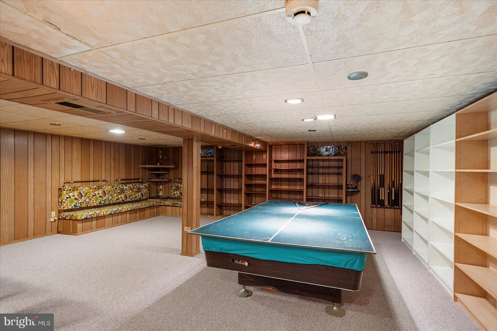 8261 Spring Knoll Drive Pasadena, MD 21122 - Photo 31 of 49 a view of a room with gym equipment