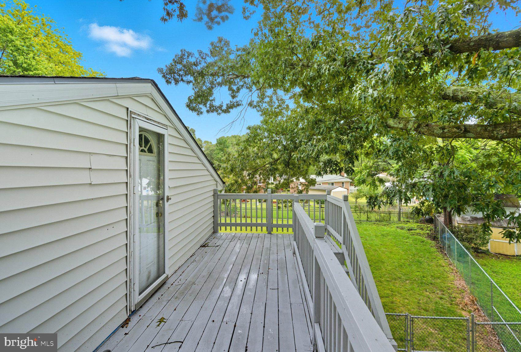 8261 Spring Knoll Drive Pasadena, MD 21122 - Photo 34 of 49 a view of outdoor space and deck