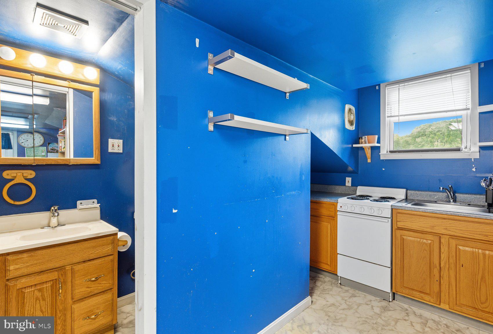 8261 Spring Knoll Drive Pasadena, MD 21122 - Photo 42 of 49 a utility room with dryer and washer