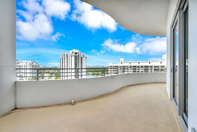 a view of a balcony with city view