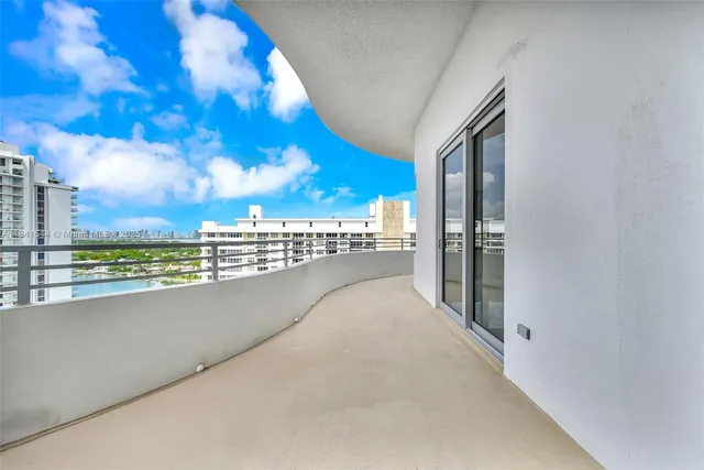 a view of balcony with city