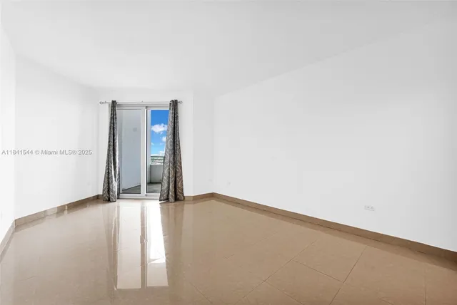 a view of hallway with closet