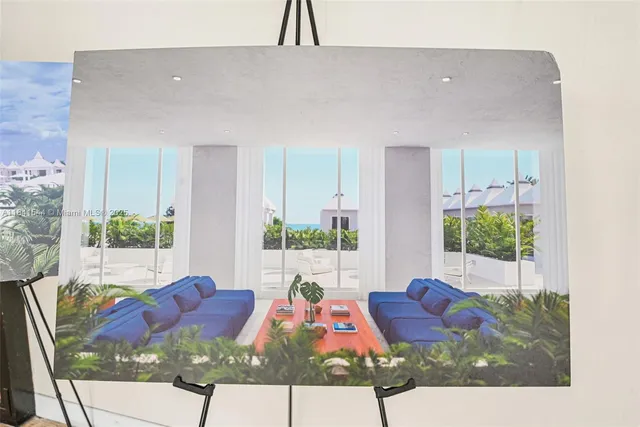 a view of a swimming pool with lawn chairs and plants