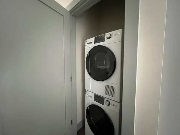 a close up view of a washer and dryer in a utility room