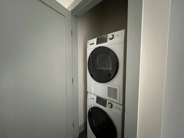 a close up view of a washer and dryer in a utility room