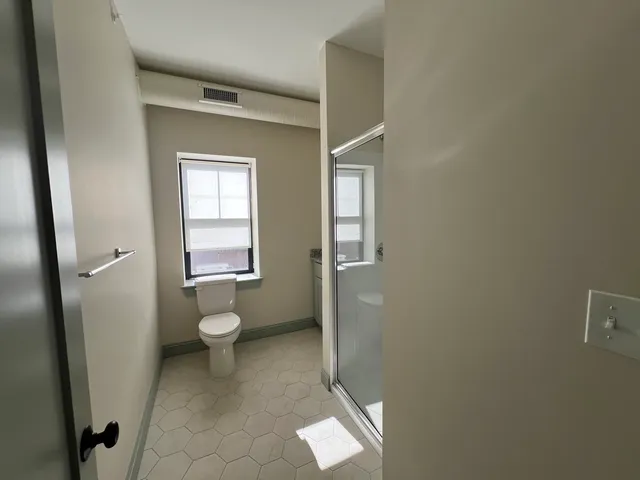 a bathroom with a toilet