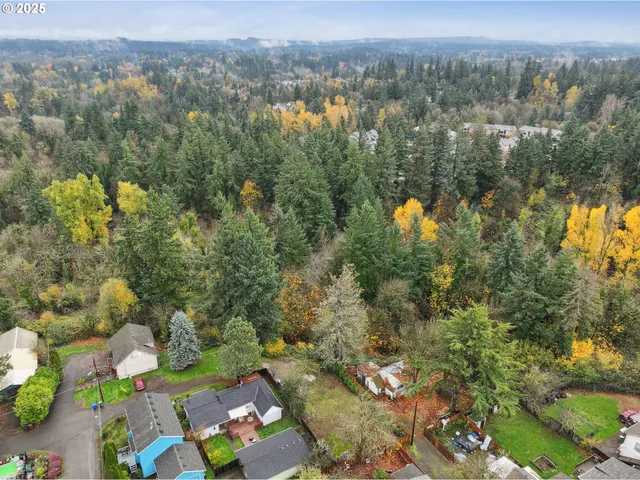 an aerial view of a town with couple of houses