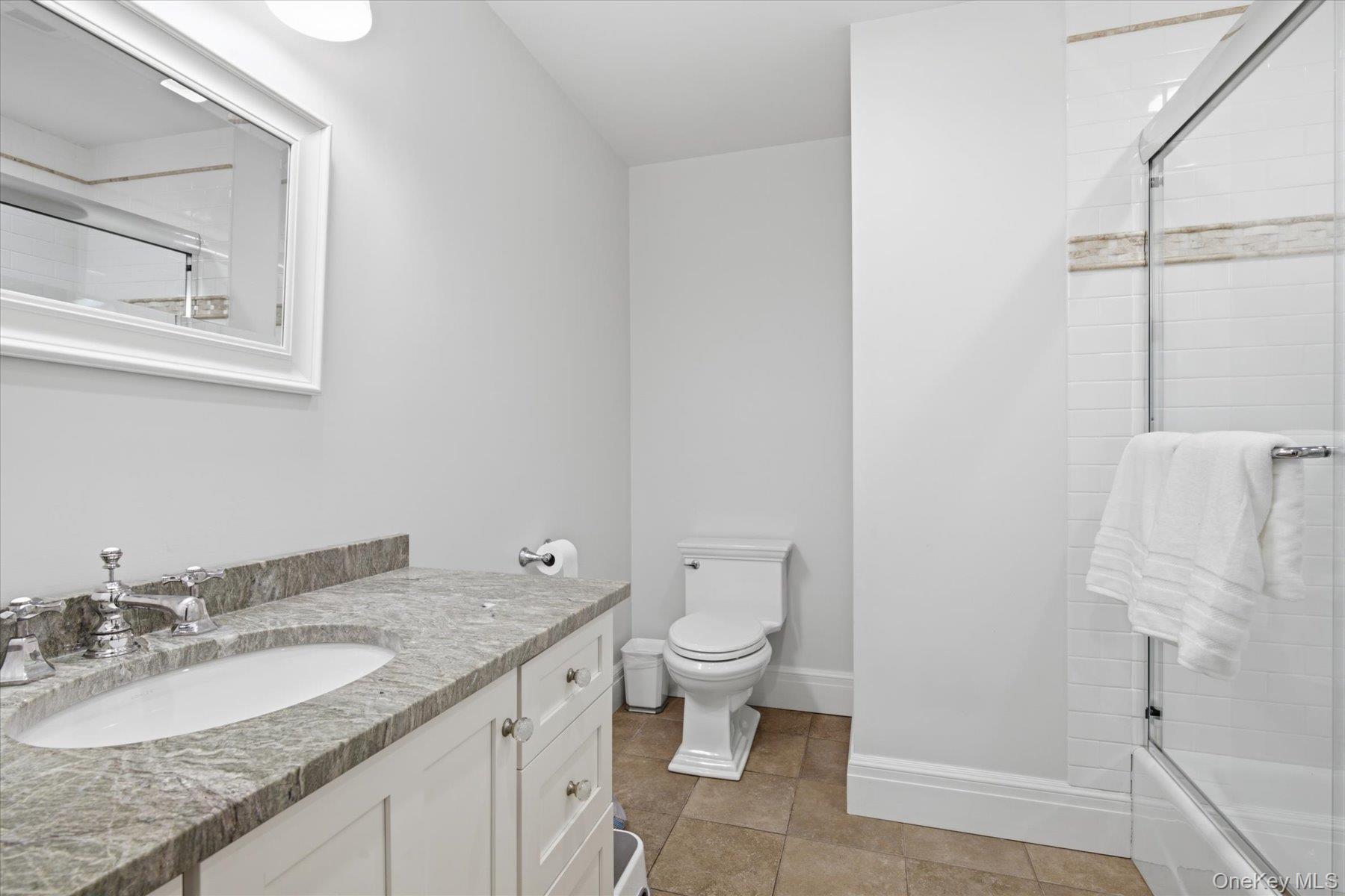 134 Sandy Hollow Road Northport, NY 11768 - Photo 18 of 28 Beautifully appointed full hall bath serving the secondary bedrooms