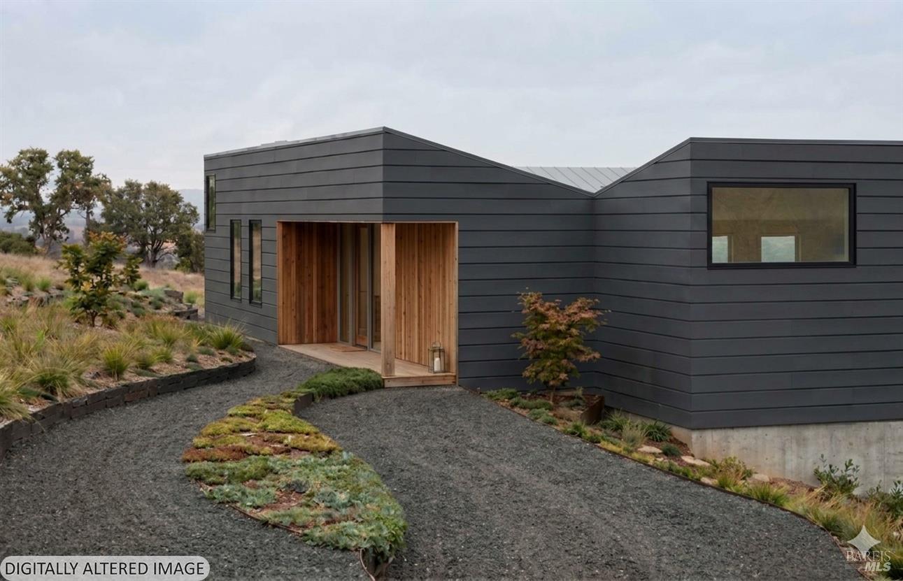 35427 Sea Gate Road The Sea Ranch, CA 95497 - Photo 4 of 35 Owners AI interpretation of the house design set in a green landscape. The landscape is NOT identical to the location of the lot.