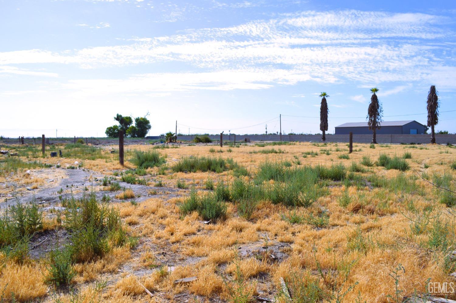 Undisclosed Address Alpaugh, CA 93201 - Photo 1 of 4 a view of a lake with a nearby beach