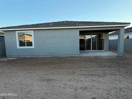 a view of a swimming pool with a lounge chairs