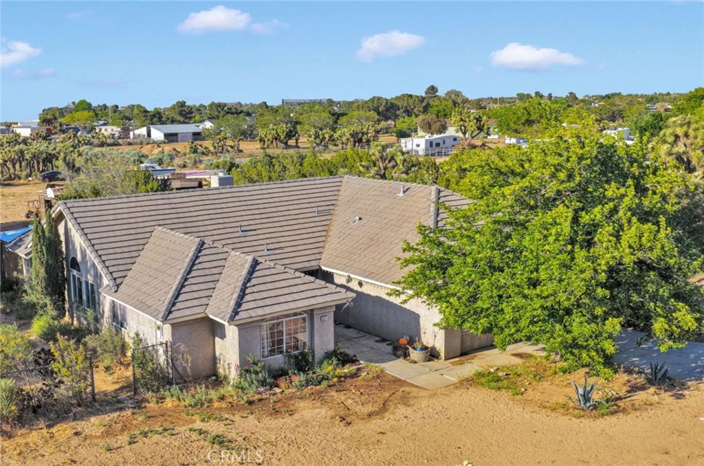 6414 Nielson Road Phelan, CA 92371 - Photo 1 of 74 a view of a terrace with a garden