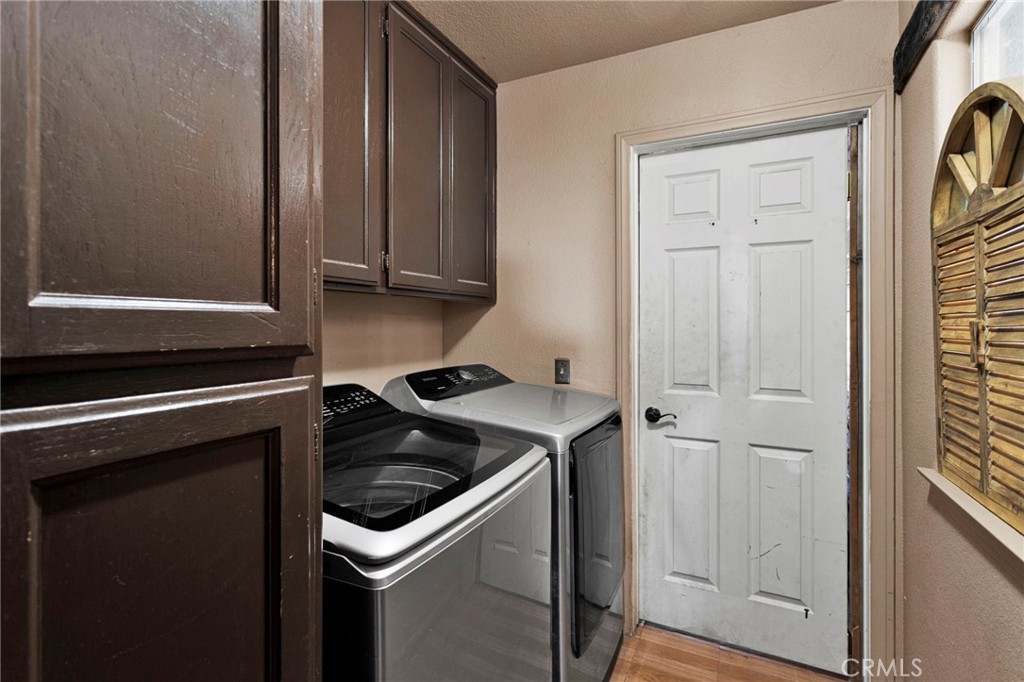 6414 Nielson Road Phelan, CA 92371 - Photo 33 of 74 a kitchen with a stove and a refrigerator