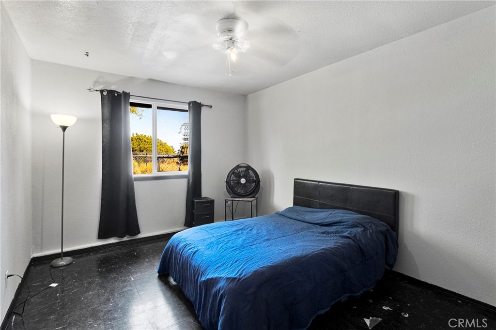 6414 Nielson Road Phelan, CA 92371 - Photo 35 of 74 a bedroom with a bed and painting on the wall
