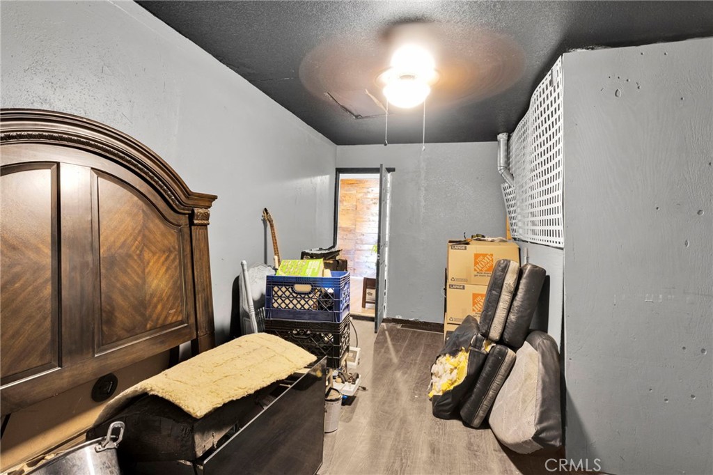 6414 Nielson Road Phelan, CA 92371 - Photo 55 of 74 a bedroom with furniture and a window